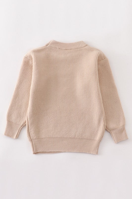 Beige round neck sweater