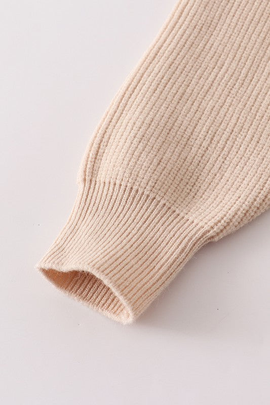 Beige round neck sweater