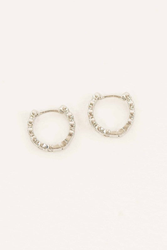 Surreal Huggie Hoop Earrings
