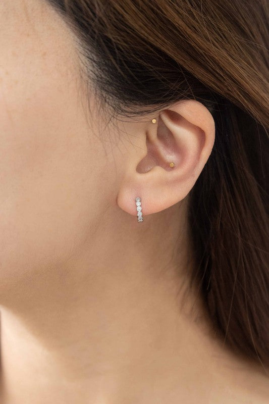 Surreal Huggie Hoop Earrings