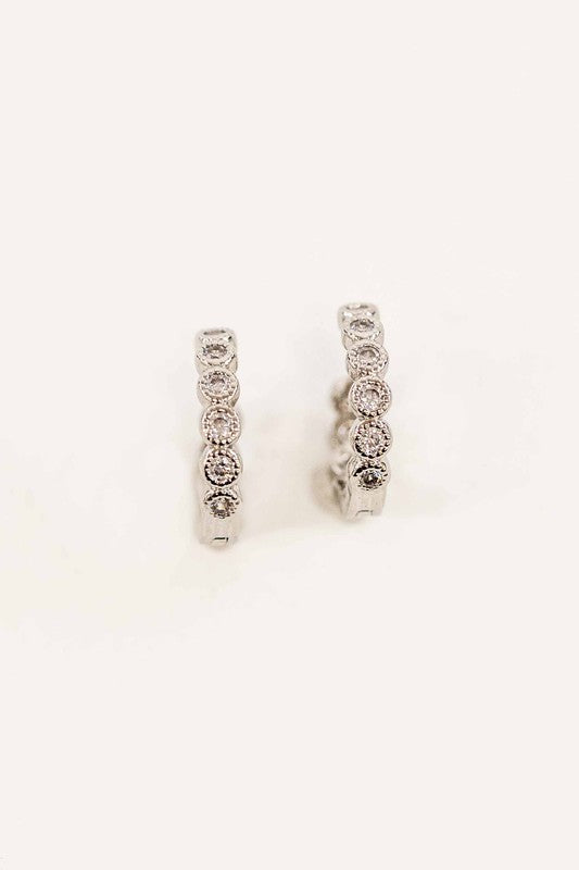 Surreal Huggie Hoop Earrings