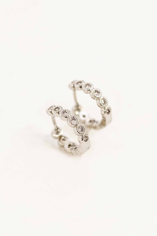 Surreal Huggie Hoop Earrings